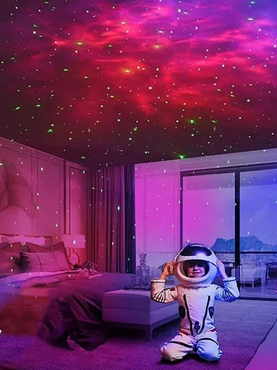 Child in astronaut costume under galaxy projector lights in modern bedroom