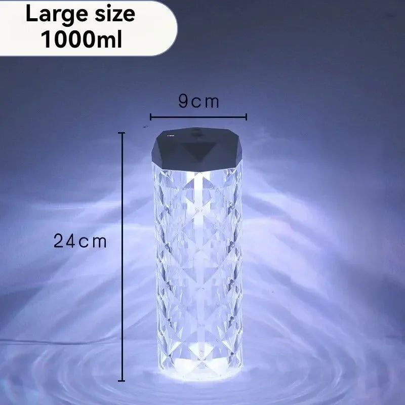 Crystal-patterned 1000ml water bottle with black cap, 24cm tall, 9cm wide, illuminated base.