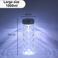 Crystal-patterned 1000ml water bottle with black cap, 24cm tall, 9cm wide, illuminated base.